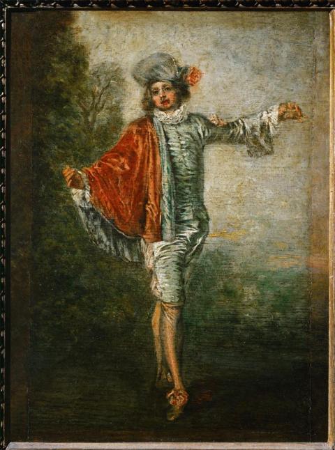 Young man in elaborate hat and dress flourishes his cloak as he begins a dance.