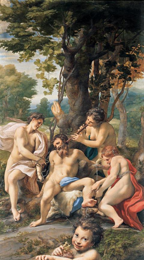 A mostly nude faun tied to the base of a tree and surrounded by nude maenads, draped in snakes. A young faun dances at the front of the image, dangling grapes by his chin. 